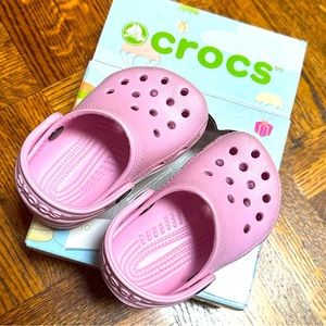 Pink crocs. Great water shoes or just for a day out for any season.